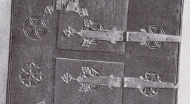 Detail překrytí řezby kováním ( F. Cimburek, dějiny nábytkového umění)